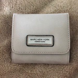 this is a marc new york wallet.
